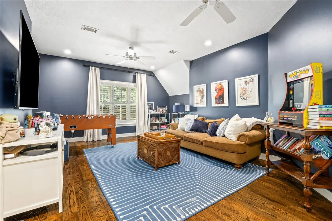 Versatile upstairs recreation space.