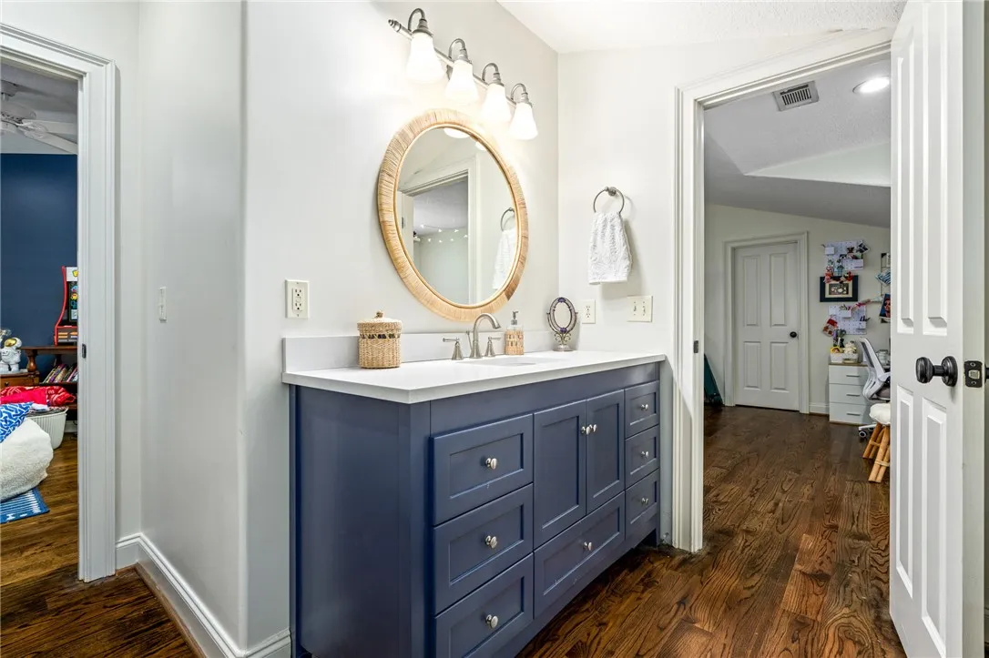 Full bathroom with access by the bonus room or 3rd upstairs bedroom.