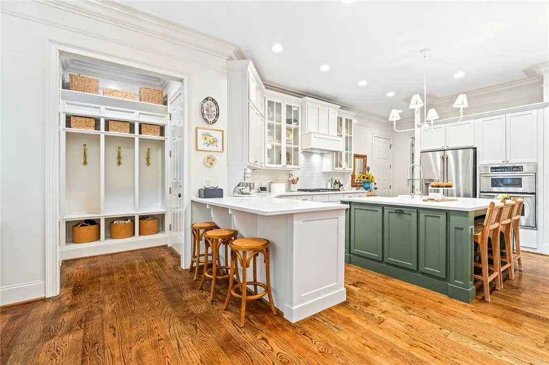 Double Island concept kitchen and mud area.