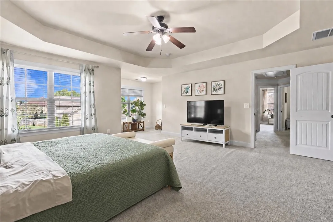 The main bedroom also features a cozy nook which could be a sitting area or workout area.