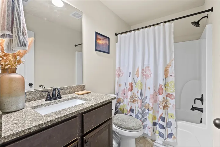 There is also a second full bathroom upstairs.