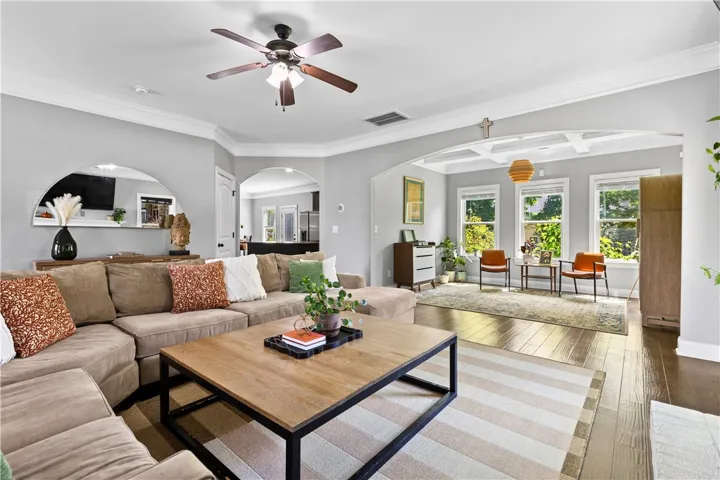 Arched openings add character and interest while also creating connection between the rooms.