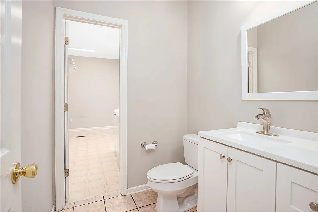 Half Bathroom into Laundry Room