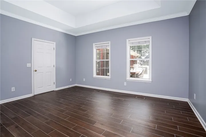 Primary Bedroom with Trey Ceiling and Great Natural Light!