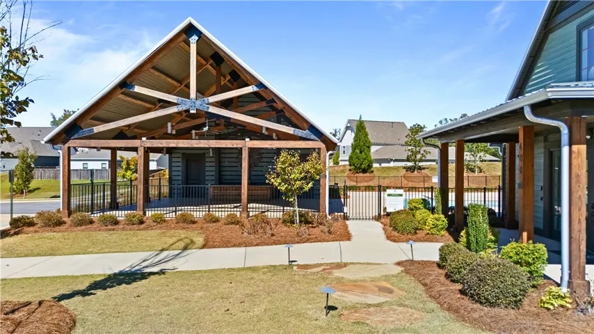 Covered pavilion provides shaded and the perfect for grilling out with neighbors & family.