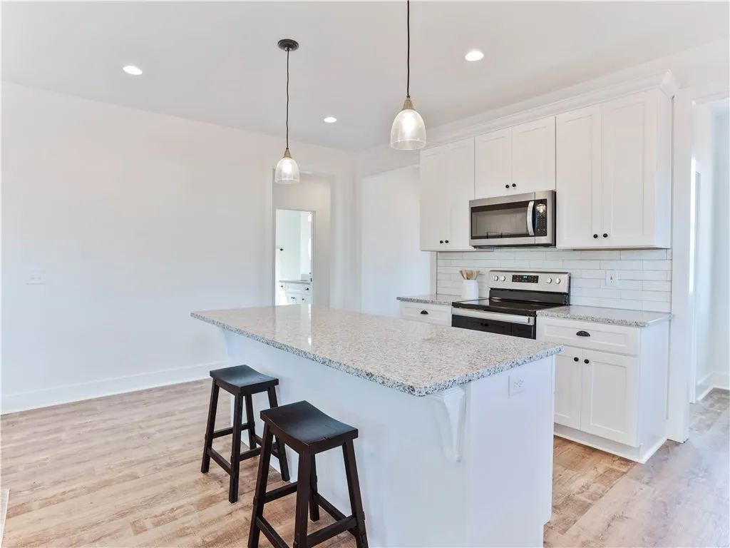 Example of completed and furnished interior of Tate A floor plan.