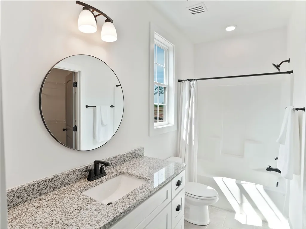 Example of completed and furnished interior of Tate A floor plan.