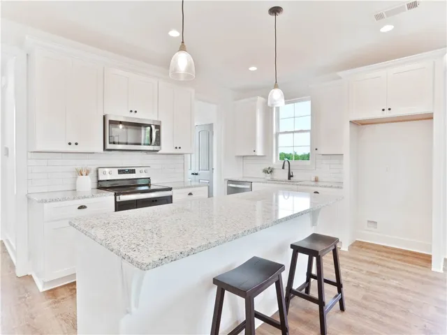 Example of completed and furnished interior of Tate A floor plan.