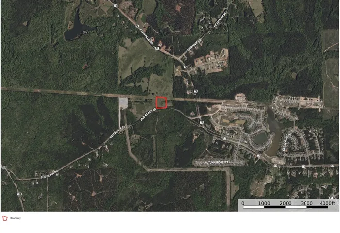 An aerial map highlights the exact boundaries of this prime country acreage.