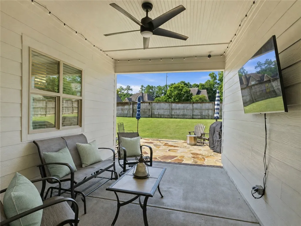 Just off the kitchen, the breezeway provides a comfortable transition outdoors.