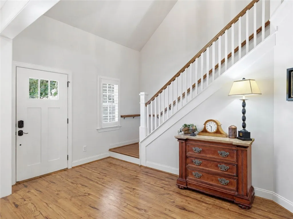 A gracious two-story foyer sets the tone for the home’s inviting style.
