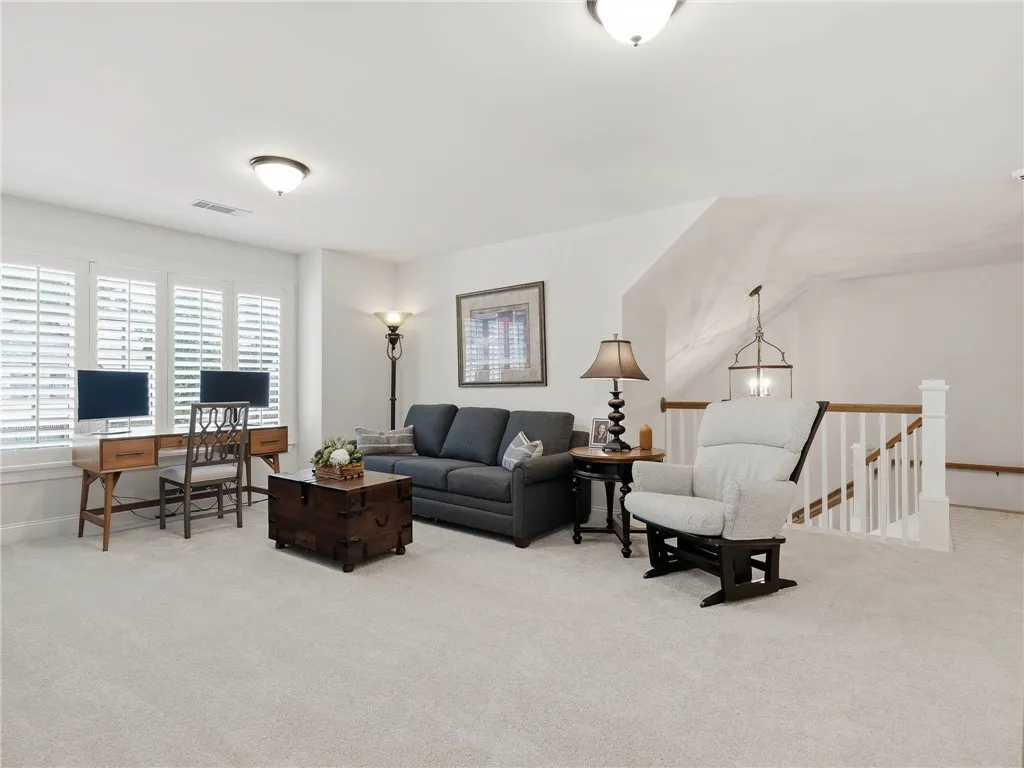 Located at the top of the stairs, the spacious loft provides a versatile spot for all ages.