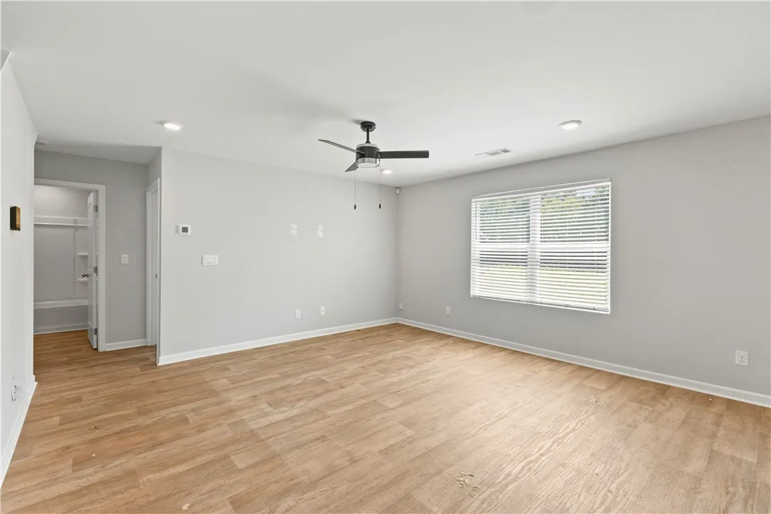 Great room with lots of natural sun light and no carpet