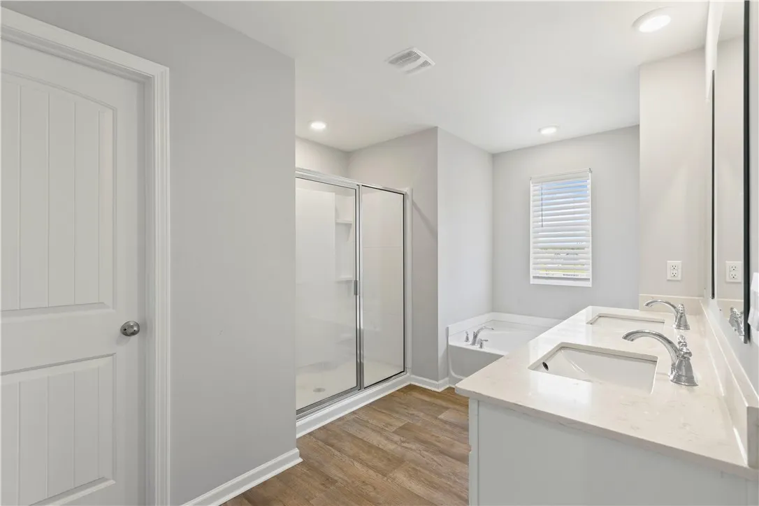 Primary bath has comfortable size shower