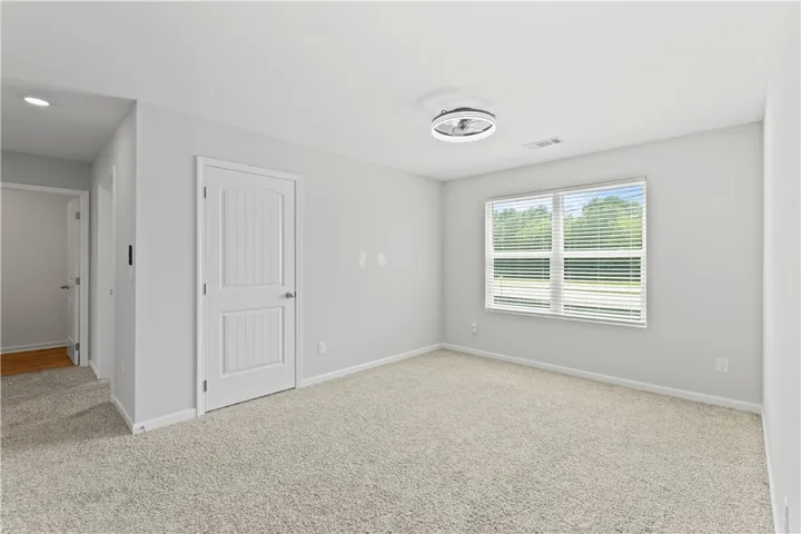 open area for entertaining or movie night or flex space to use as you would like.