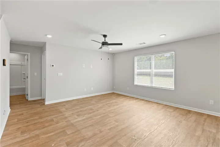 Great room with lots of natural sun light and no carpet