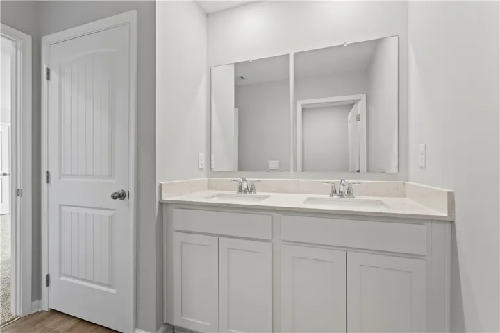 2nd floor hallway bath with 2 sinks.