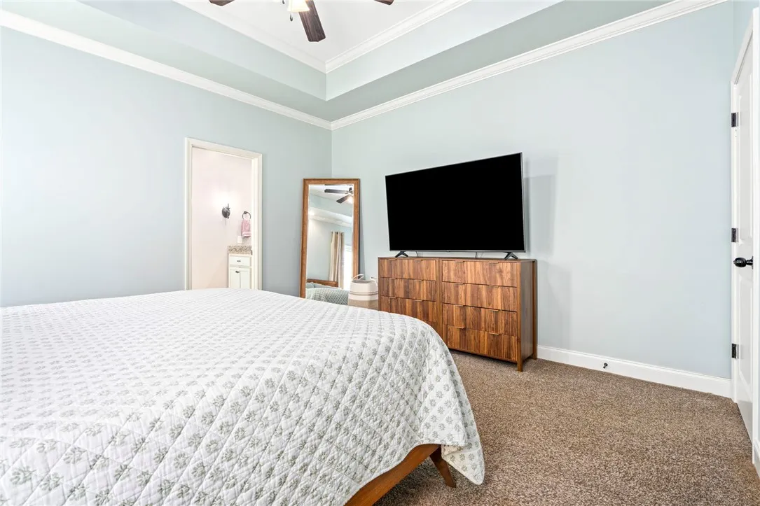 The spacious primary bedroom comes complete with an ensuite
