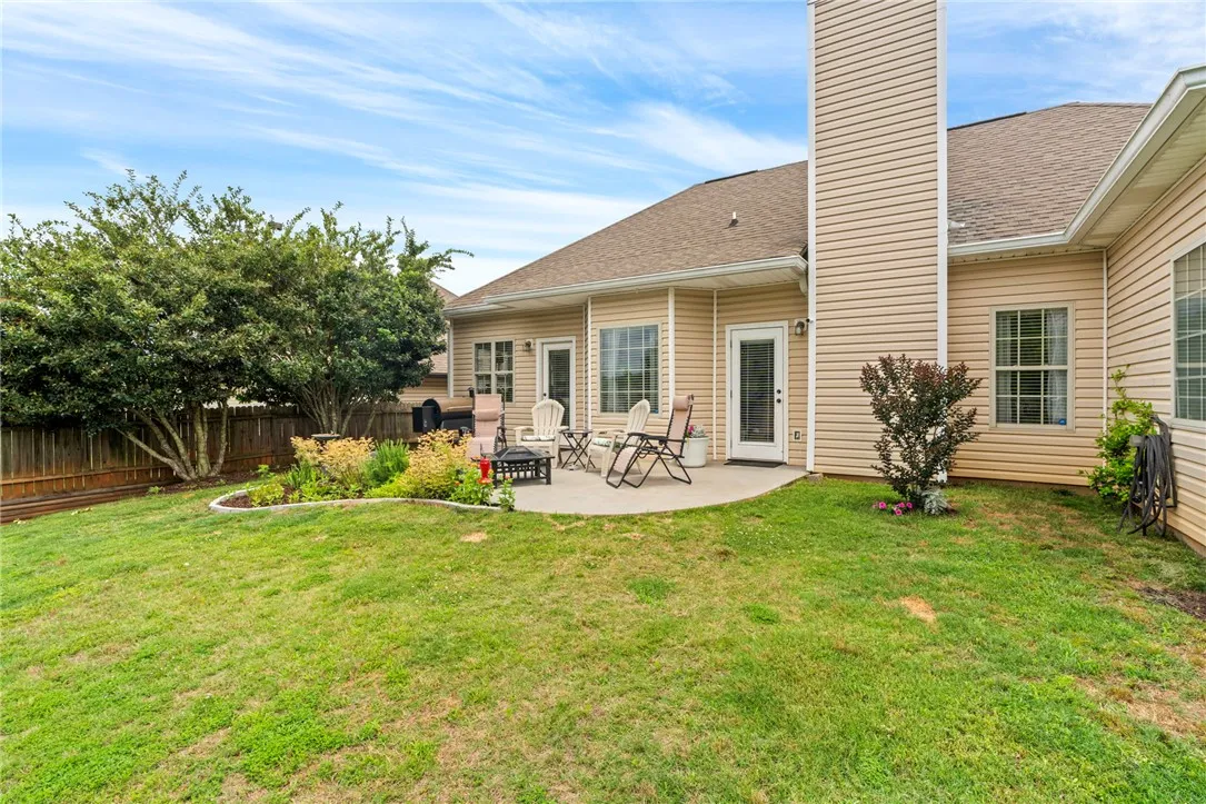 Spacious patio and fenced backyard