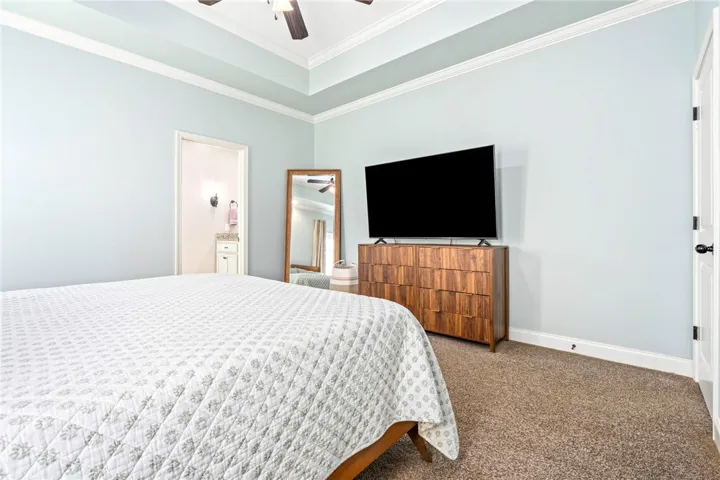 The spacious primary bedroom comes complete with an ensuite