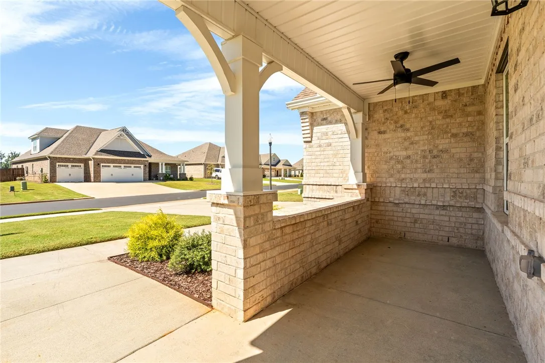 Covered front porch with ceiling fan