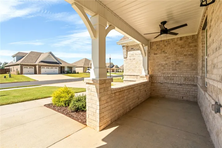 Covered front porch with ceiling fan