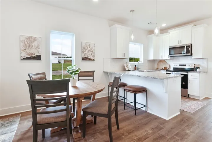New Designer Duette in Camellia Crossing! Soft close cabinets & drawers ~ Whirlpool Appliances! Tour the community today! All plans, pricing and specifications are subject to change without notice.