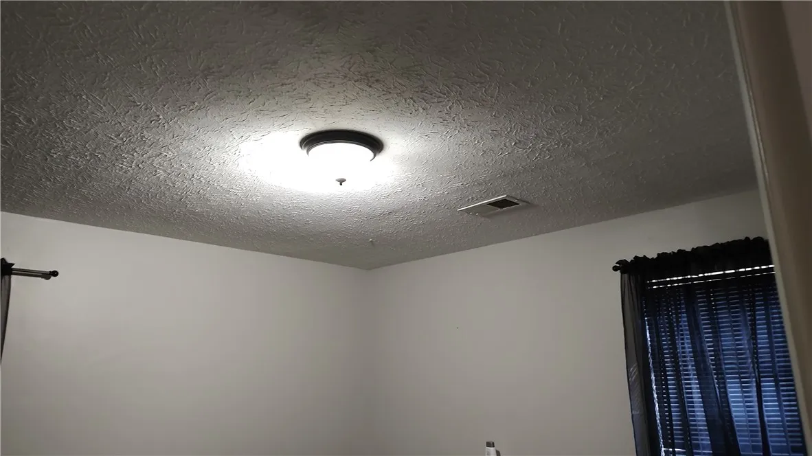 Light fixture located in the bedrooms