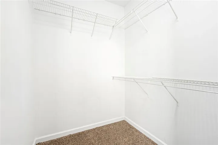 Walk-in closet in the primary bedroom
