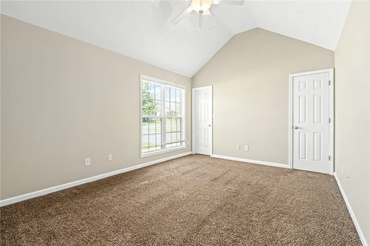 Vaulted ceilings in the primary bedroom