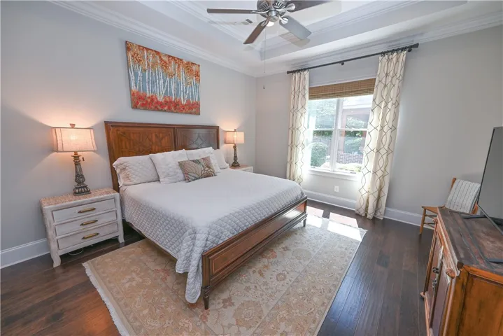 Private primary retreat with tray ceiling and automated window shades!