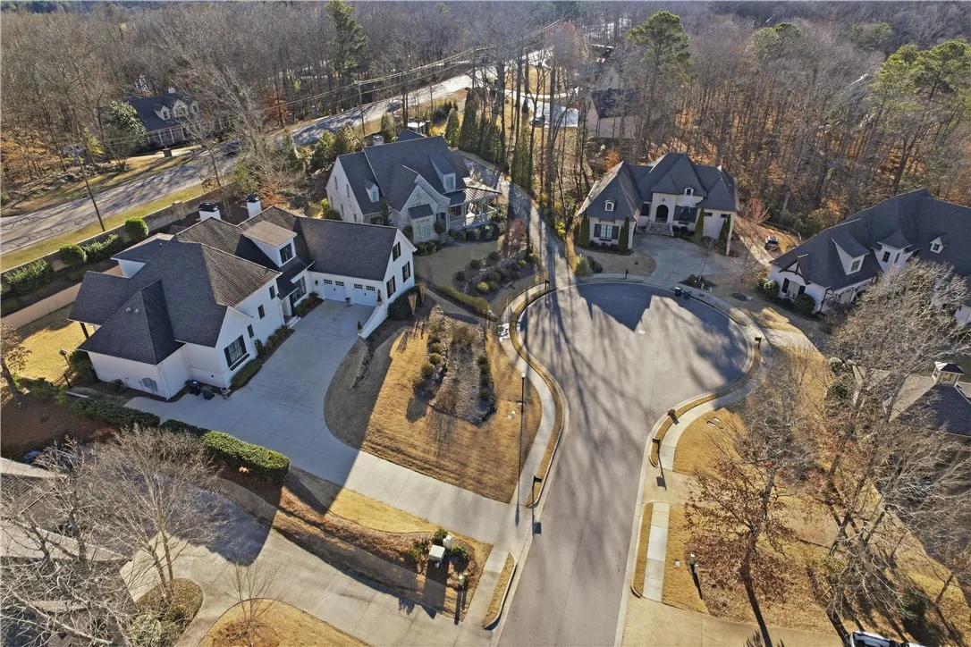Carrington Court offers upscale homes, a broad cul-de-sac, sidewalks, and a welcoming neighborhood feel.