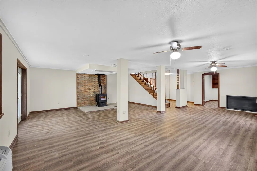 The basement has a new wood burning fireplace