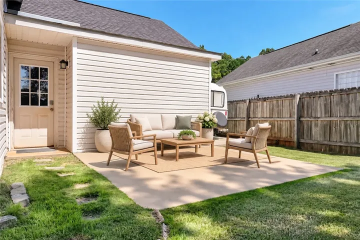 Virtually Staged Patio Area with RV Storage!