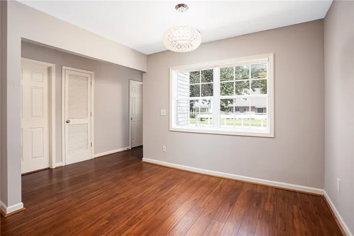 Dining Space or Additional Living Space with Brand New Windows!