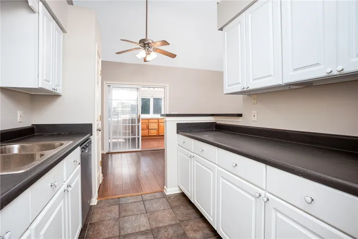 Kitchen view into Living/Sunroom