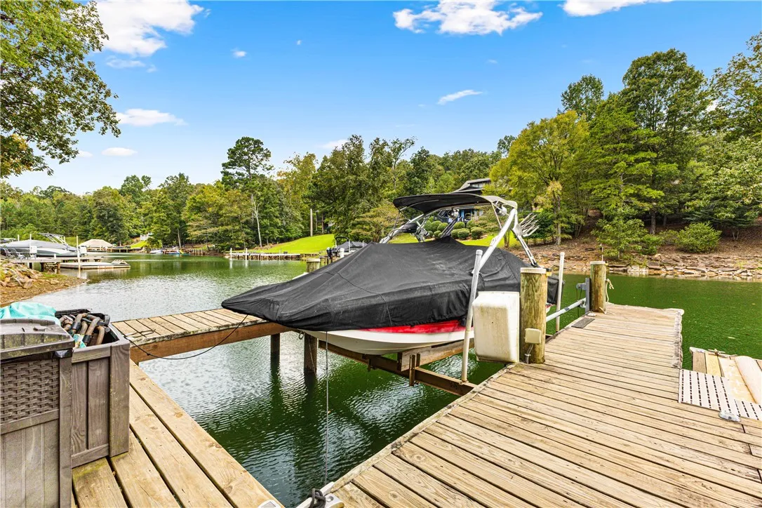 Wooden docks line the calm waterfront, offering direct access to the scenic lake.