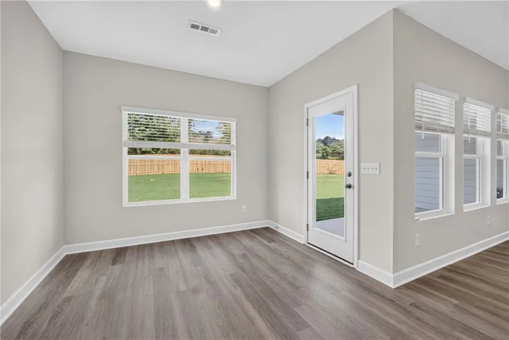 Breakfast area opens to covered backporch