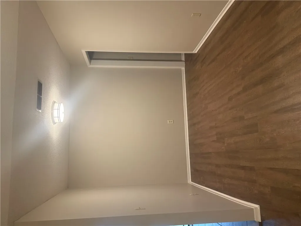 Dining area with laminate flooring.
