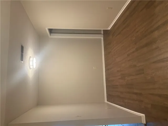 Dining area with laminate flooring.
