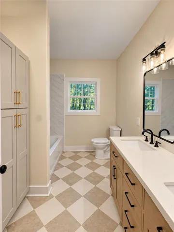 Checkerboard pattern flooring defines this bathroom featuring a dual vanity and built-in linen storage.