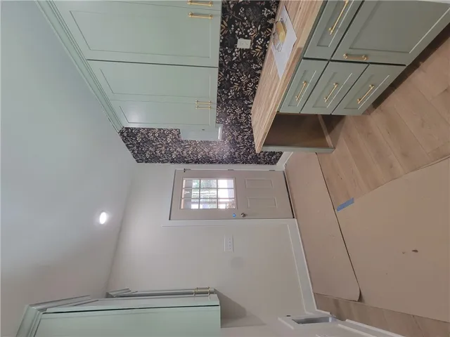 Custom cabinetry and solid wood countertops define this highly functional workspace.