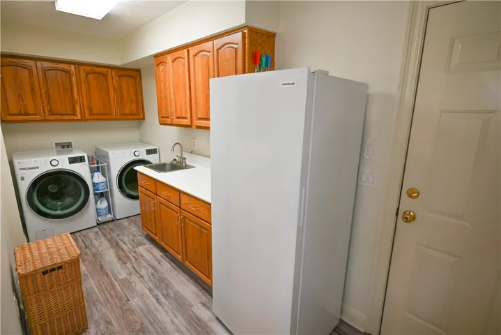 MORE STORAGE! Plus a utility sink and room for an extra fridge or freezer!
