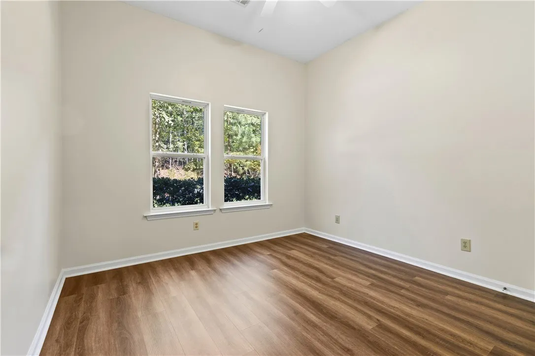Bedroom 2 is located at the front of the house. New LVP flooring and paint