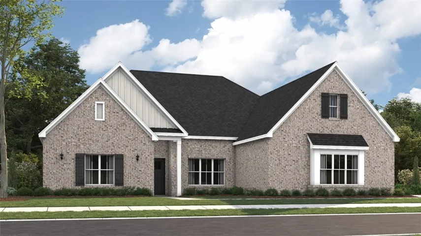Timeless brick architecture paired with clean-lined gables creates a striking and elegant first impression.