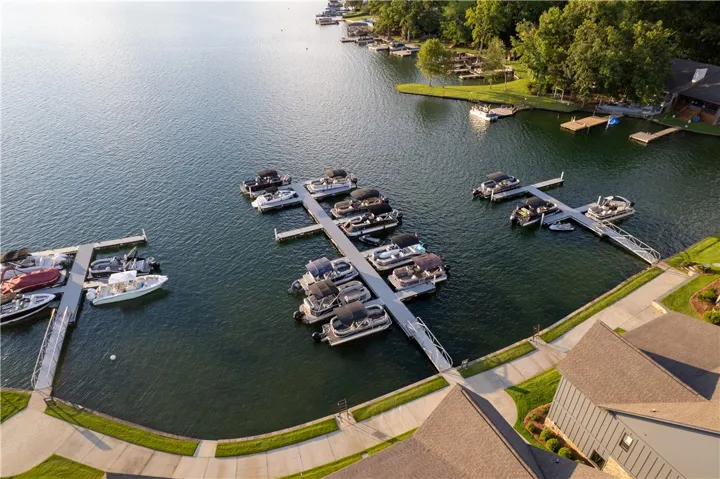 Calm waters and extensive docking facilities define this serene lakeside setting.