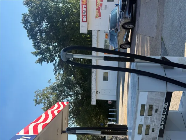 A view of the outdoor service area with functional paved driveways.