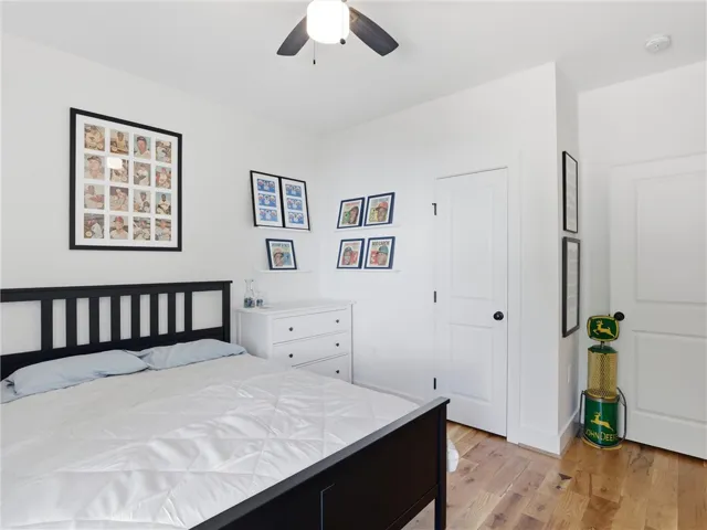 Gleaming hardwood floors run throughout this comfortable secondary bedroom.