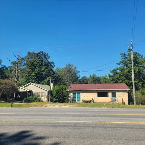 Residential Dwelling and Commercial Bldg fronting Hwy 50-Veterans Memorial Pkwy