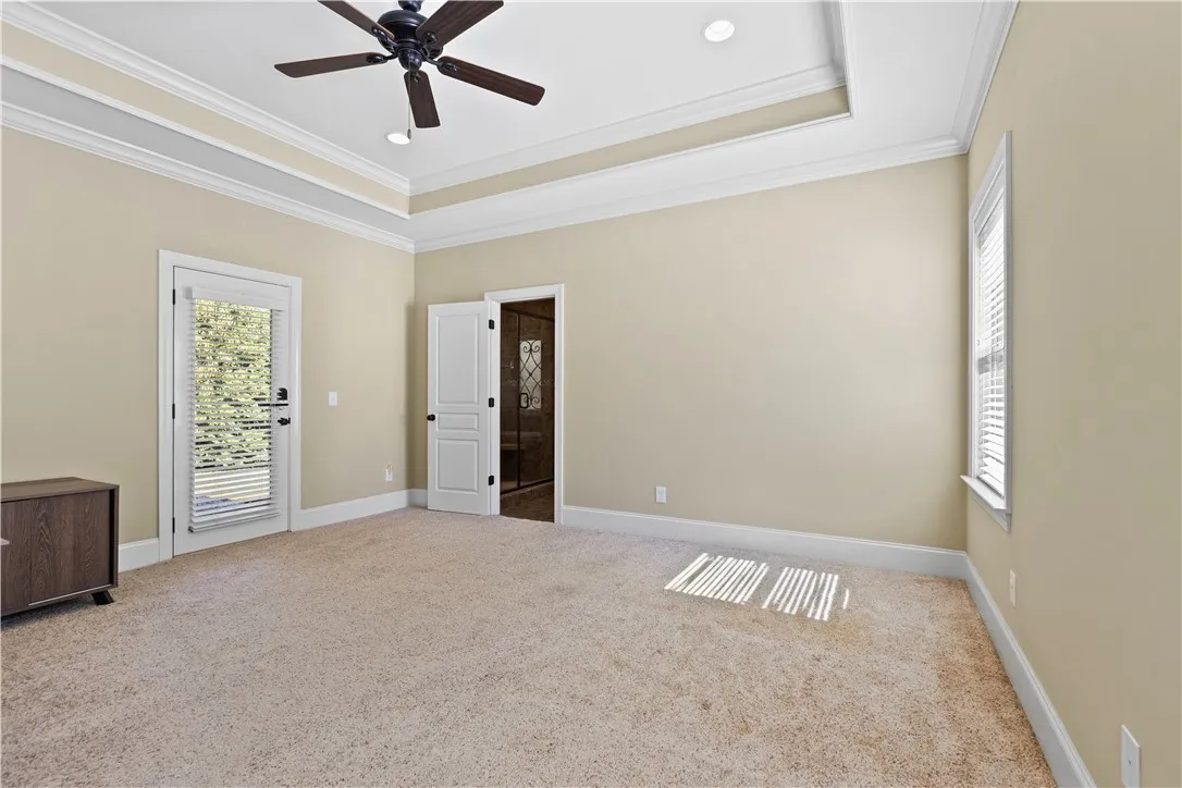 Multi-layered tray ceilings and soft carpeting define this quiet, comfortable retreat.